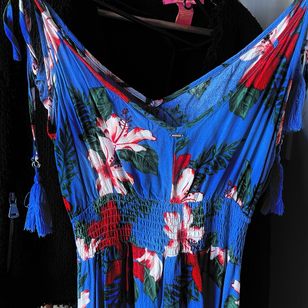 Stunning maxi dress with a thigh high split in ruffles